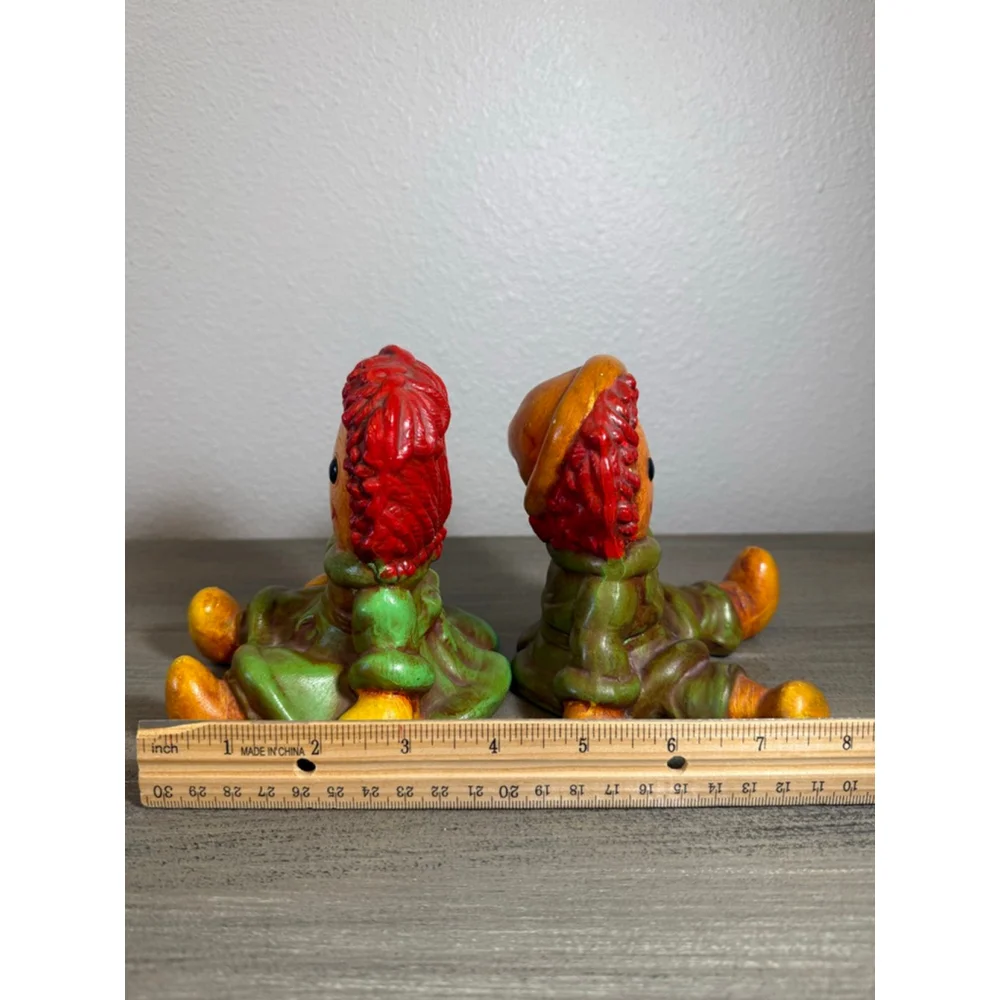 pair of vintage hand-painted ceramic figurines of Raggedy Ann & Andy